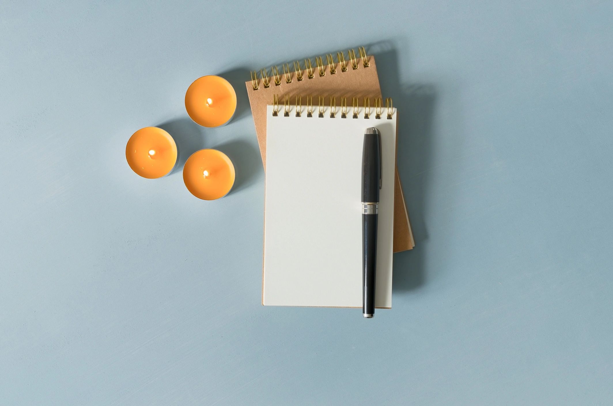 Minimal journaling setup with notebook and pen